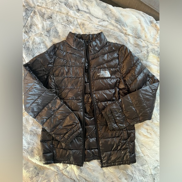Black North Face Jacket- Kids Medium 8-10. Can be both girls and boys unisex.